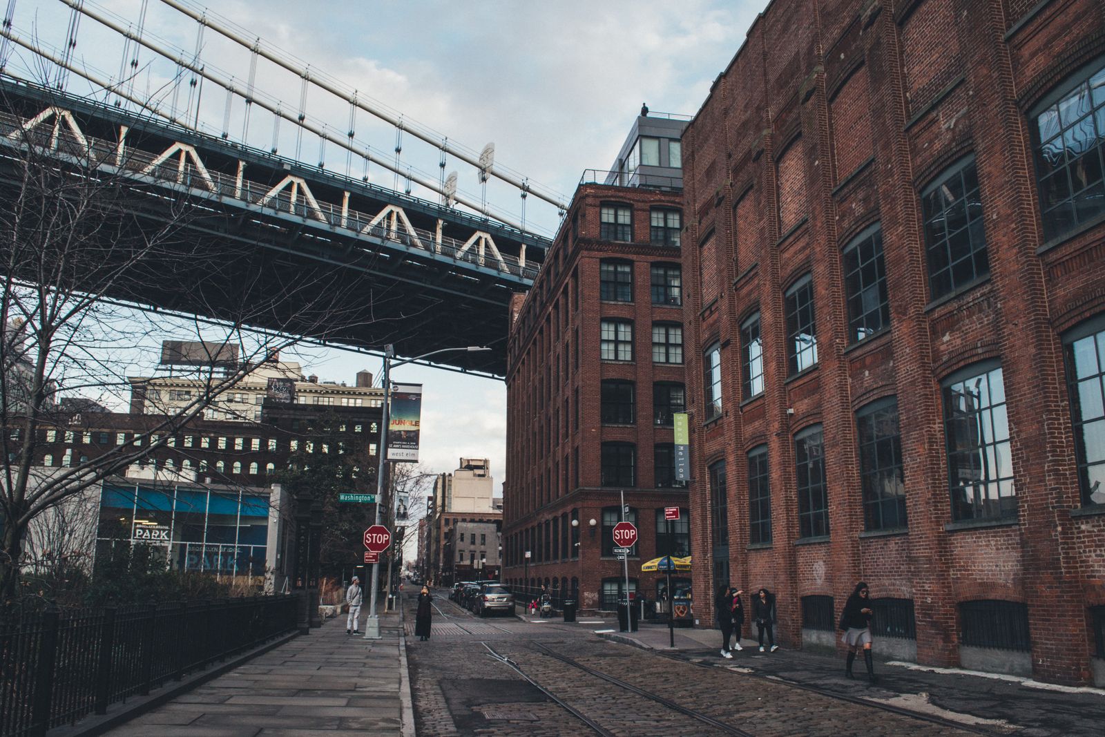 Brick commercial buildings along a Brooklyn street