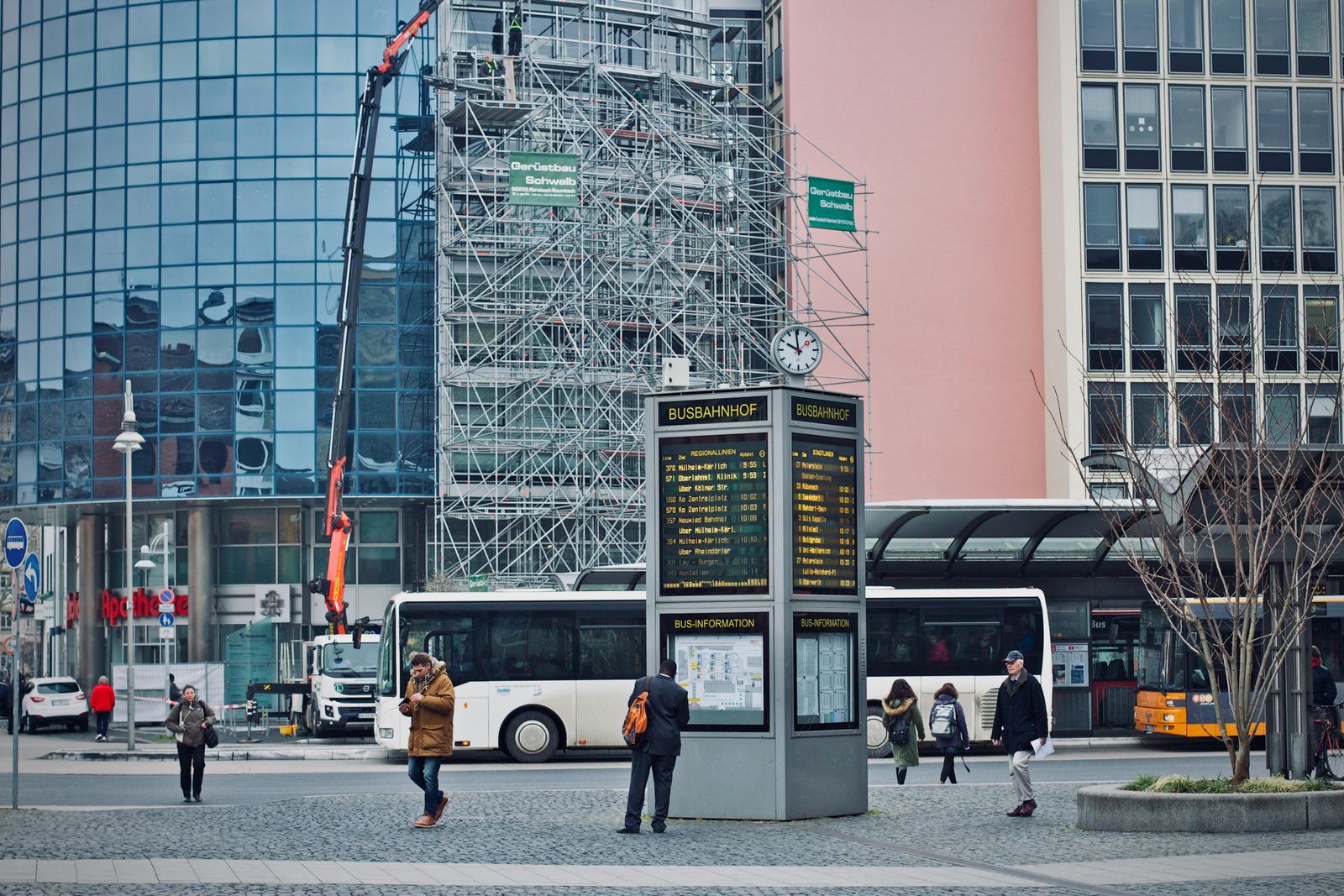 A busy urban bus transit center, representative of the Hempstead Transit Center