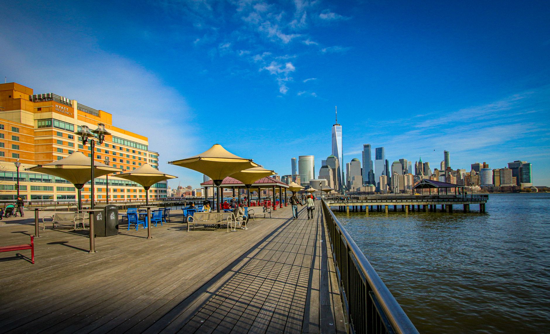 The Hudson River waterfront walkway along the Jersey City Gold Coast, Hudson County
