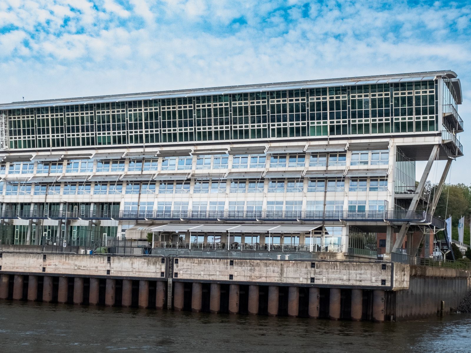 A modern waterfront building, representative of Poughkeepsie's riverfront healthcare and redevelopment