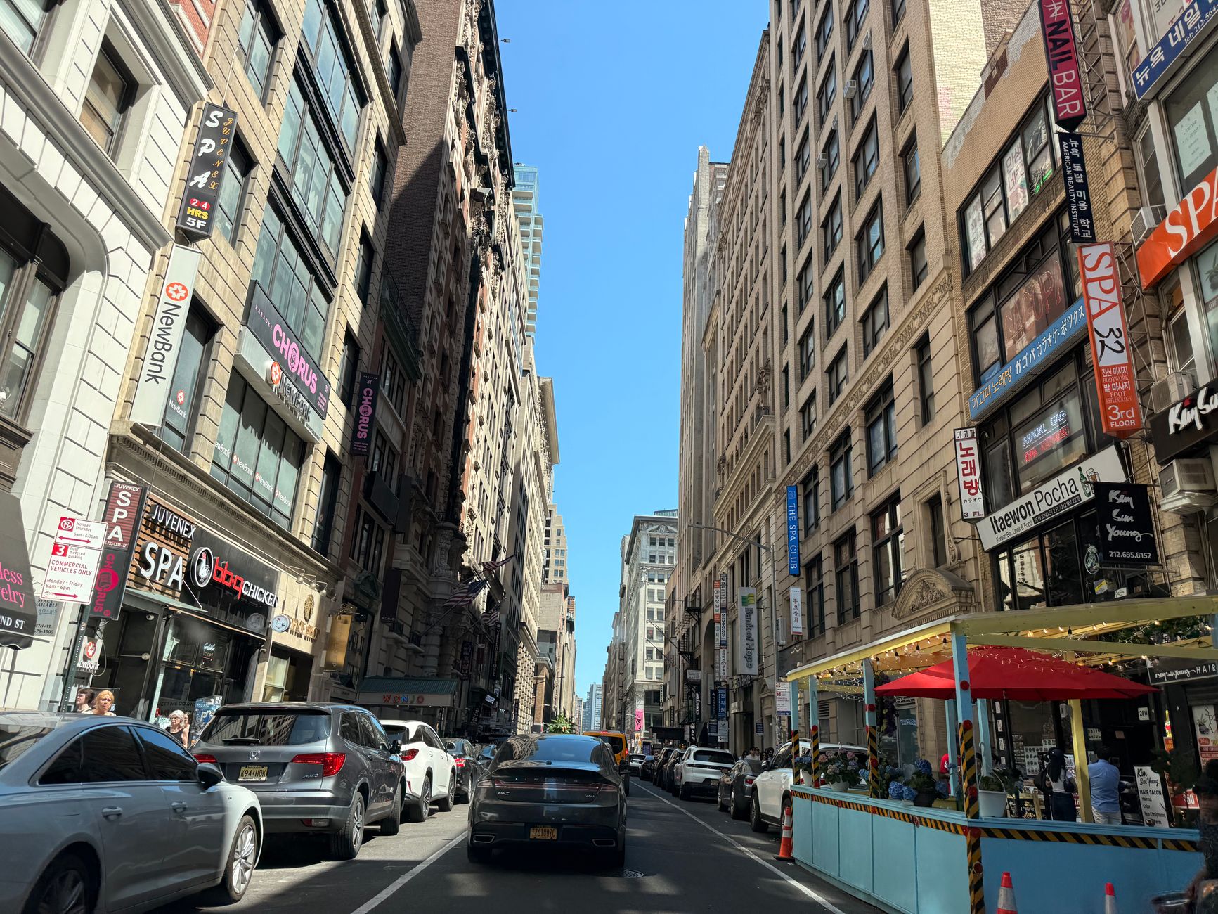 Dense commercial street, representative of Bedford-Stuyvesant's Brooklyn streetscape