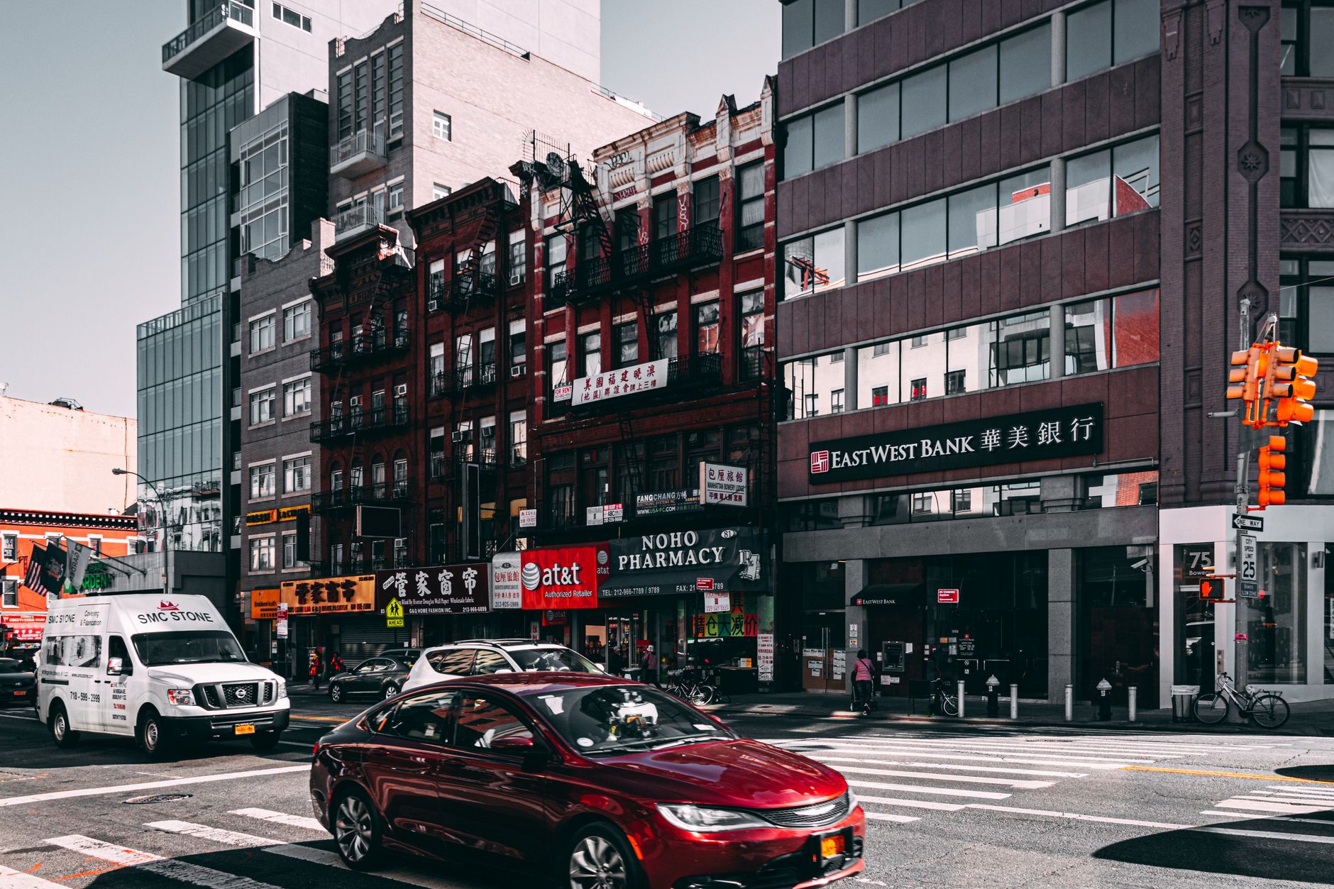 Dense commercial street, representative of Jackson Heights's 37th and Roosevelt Avenue corridors